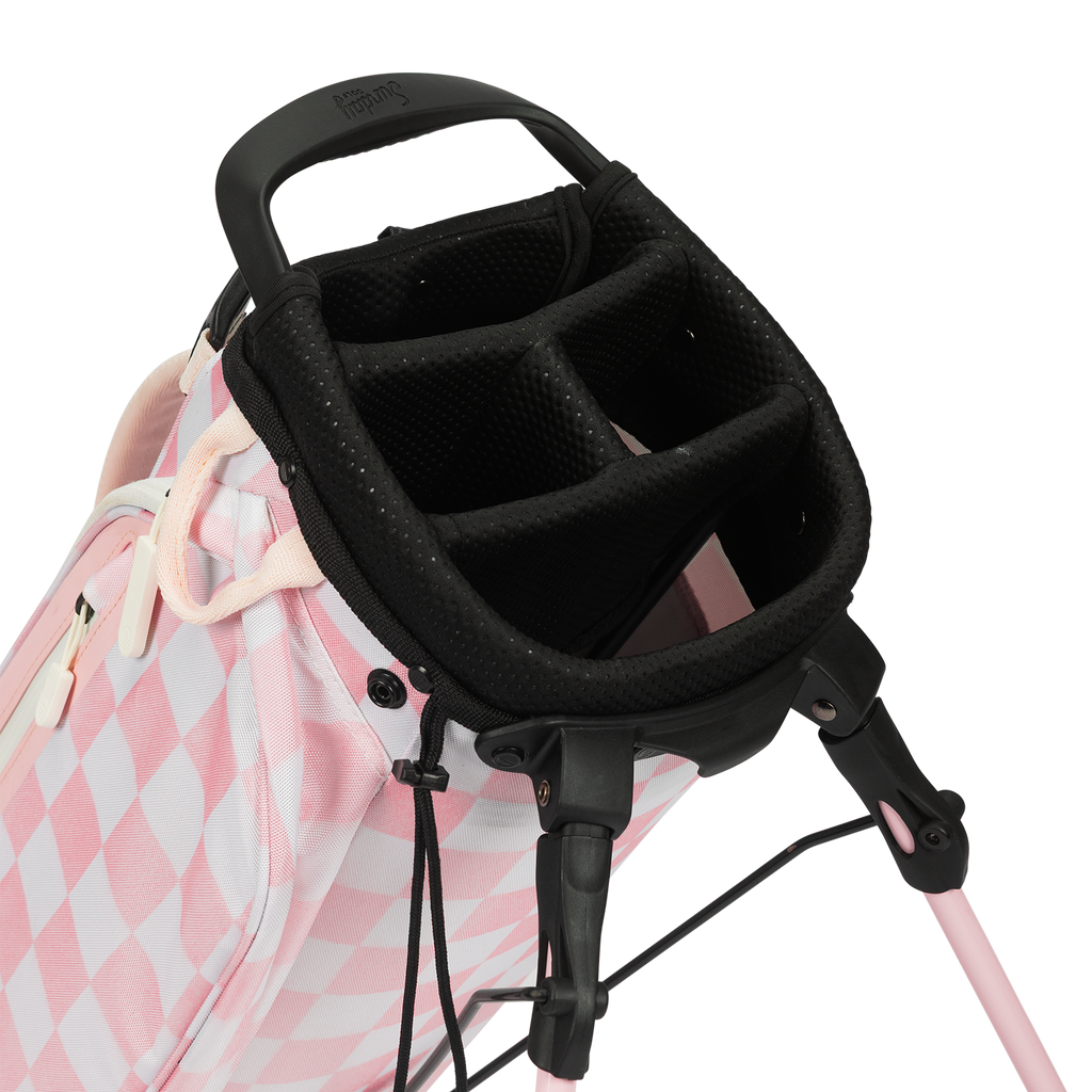 A close up top view of a Pink/White Checker El Camino golf bag's 4 way divider  
