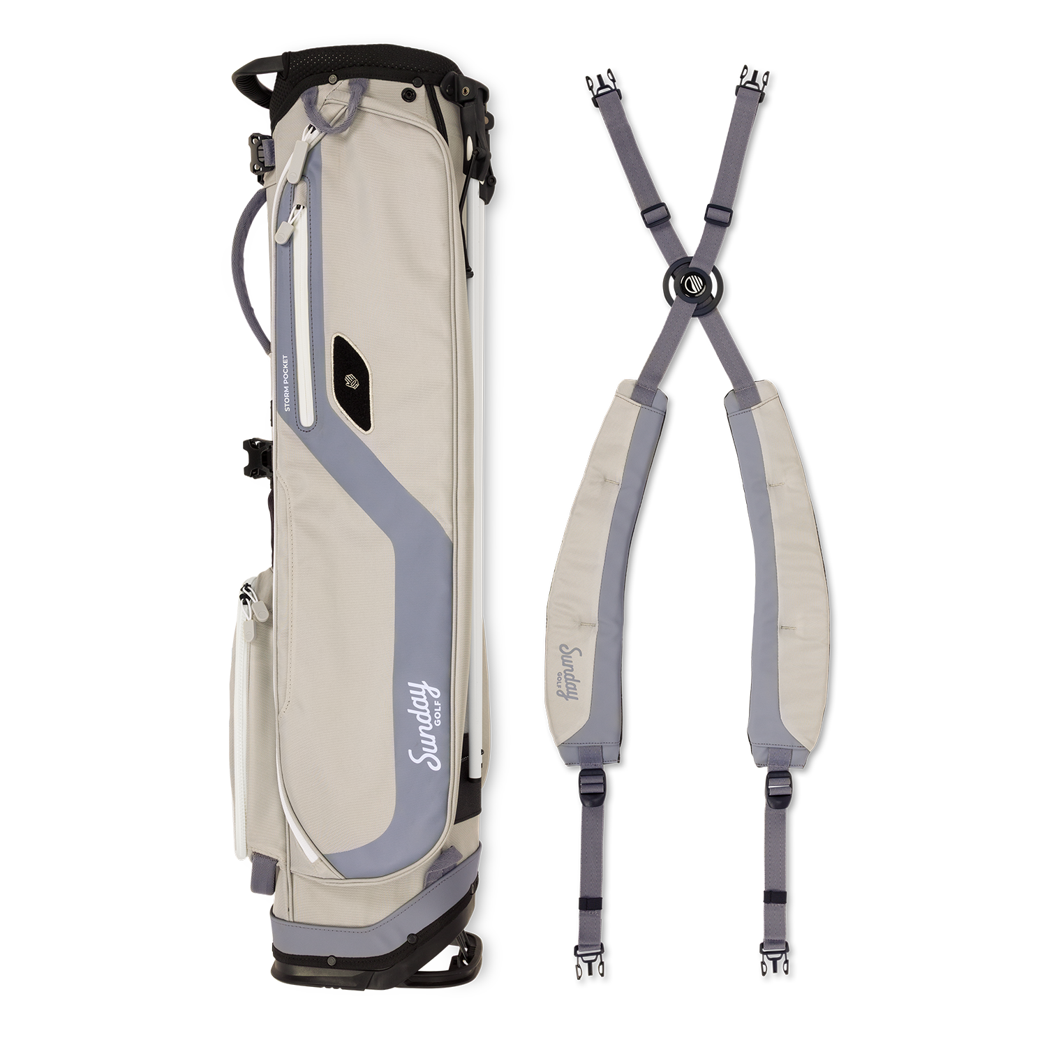 A full shot of El Camino golf bag in Cool Gray laying flat sideways beside its double strap 
