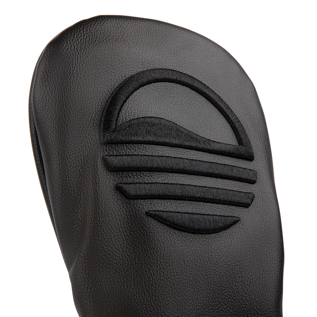 Close up shot of fairway wood golf headcover in black vegan leather showing its material and Sunday Golf logo