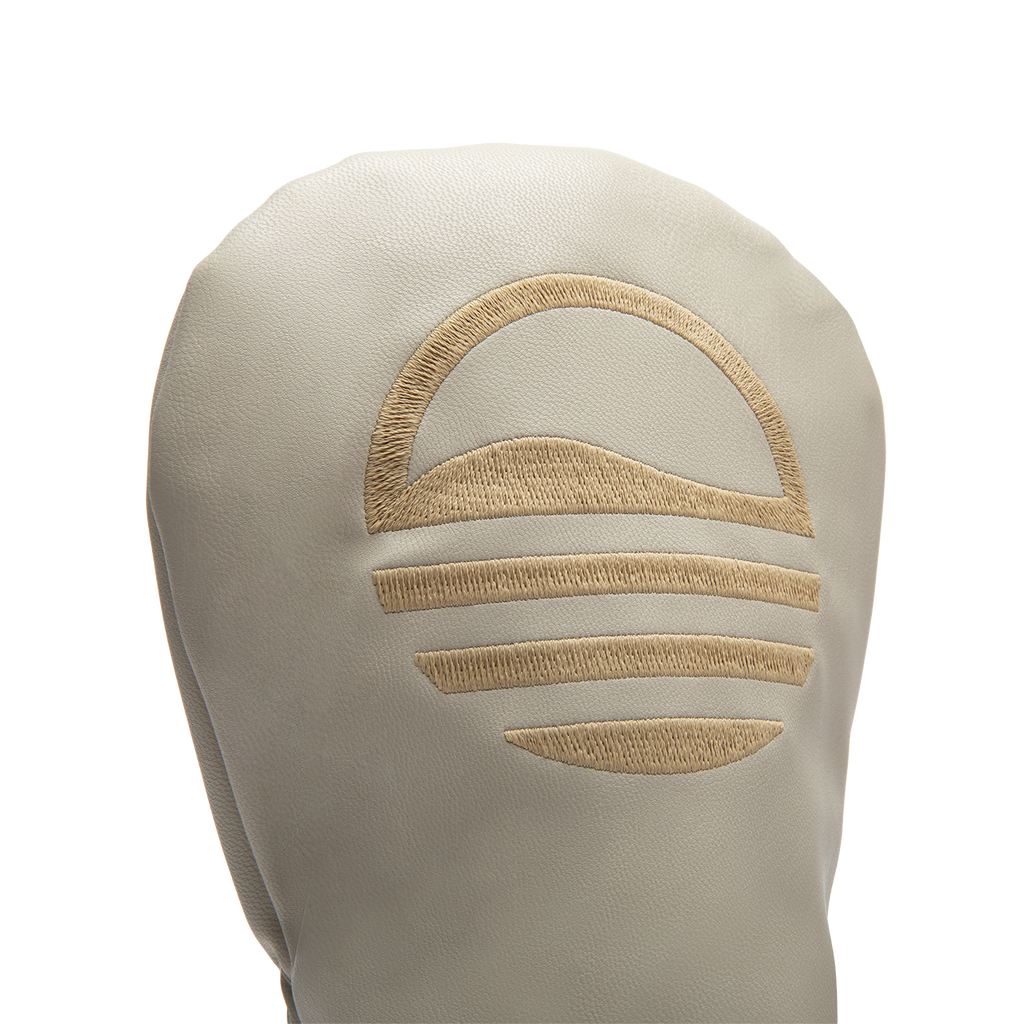 Close up shot of fairway wood golf headcover in toasted almond vegan leather showing its material and Sunday Golf logo
