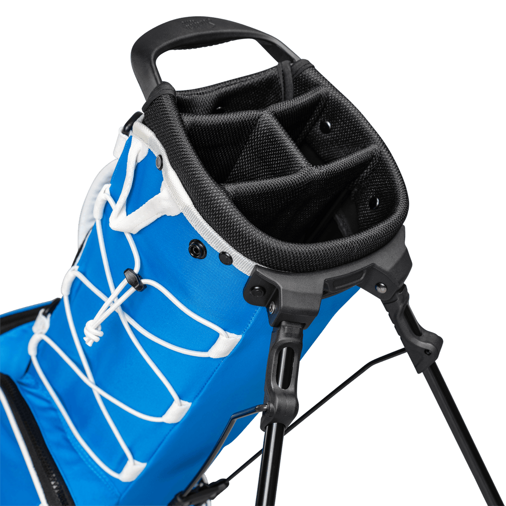 A close up top view of a blue & white Recess kids golf bag’s 4-way divider
