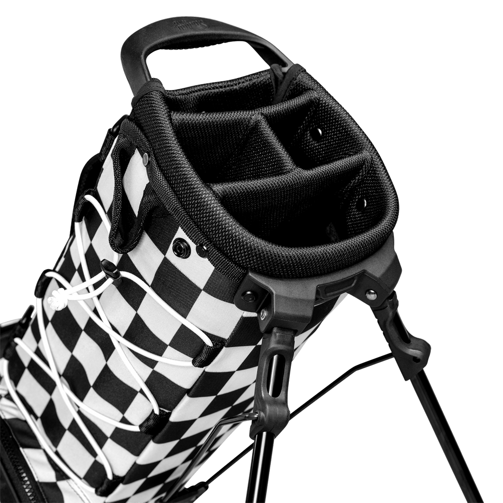 A close up top view of a checkered Black & White Recess kids golf bag’s 4-way divider