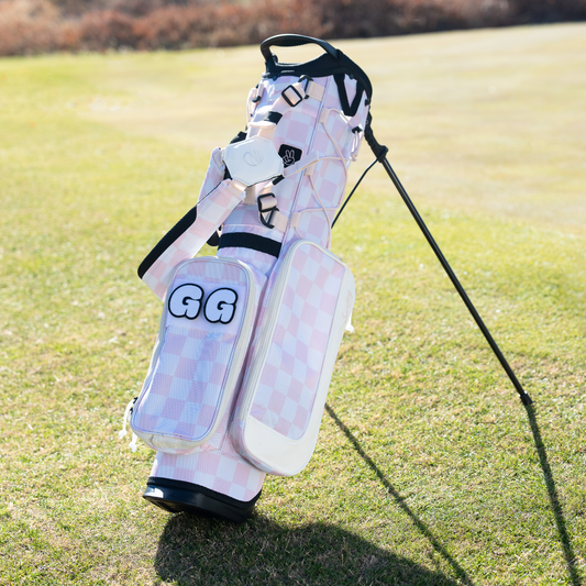 Sunday Golf's Pink and White Checkered Recess Bag, featuring 'GG' patches and key design features.