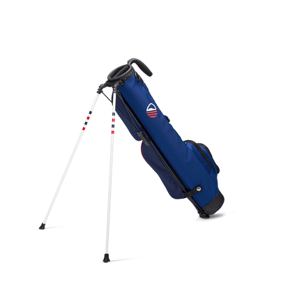 A full shot of standing Loma golf bag in Patriot facing backward
