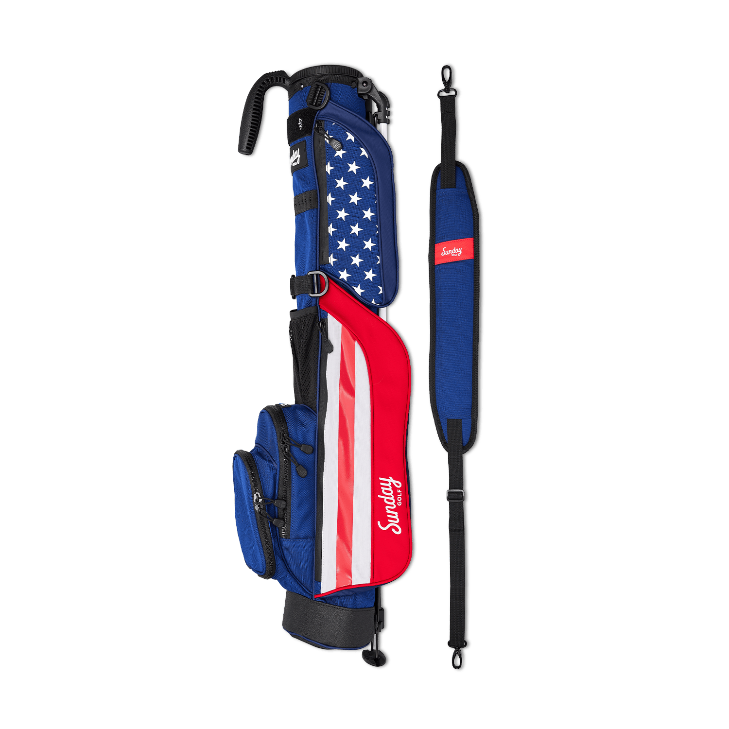 A full shot of Loma golf bag in patriot laying flat sideways beside its single strap
