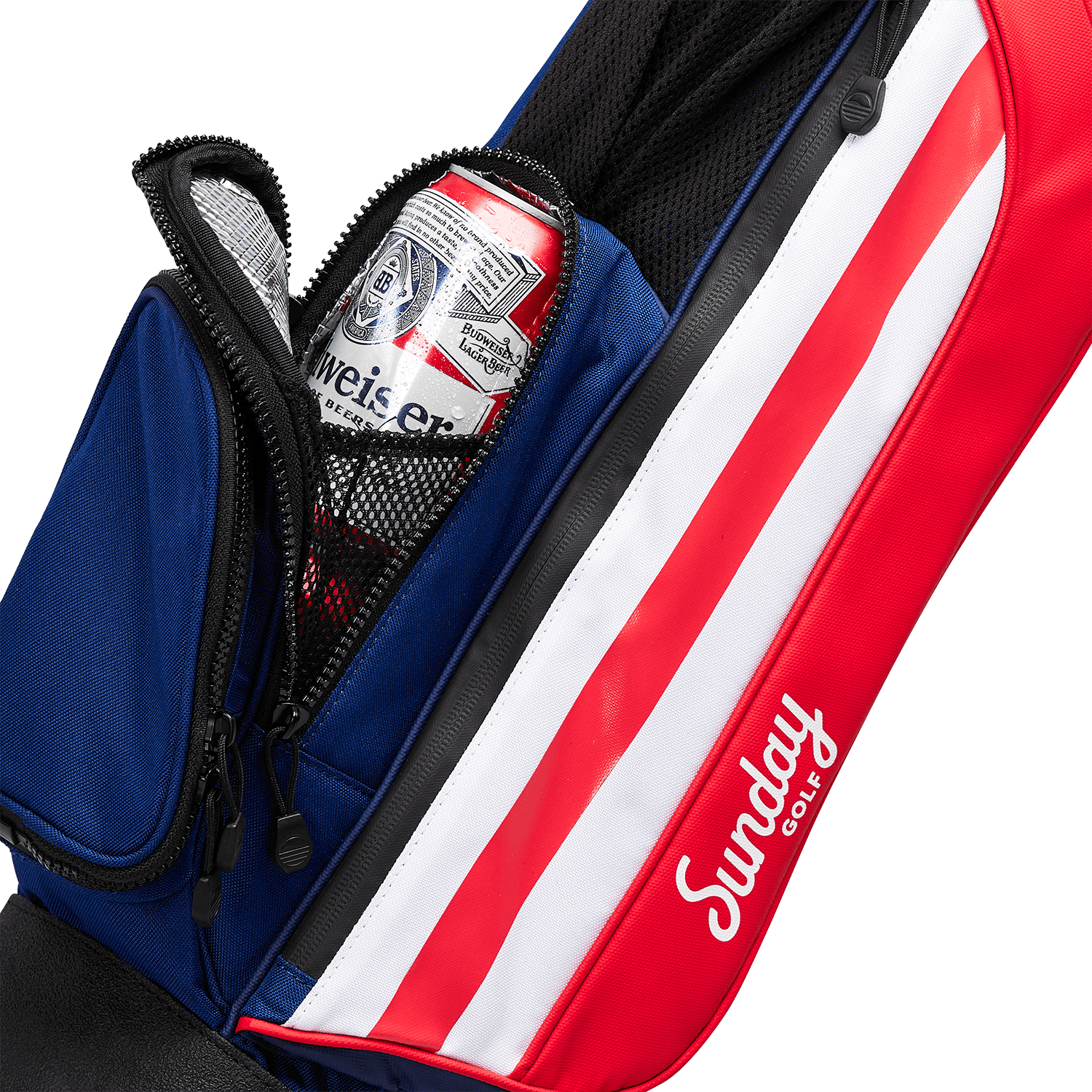 A close up shot of patriot Loma golf bag's insulated pocket with a canned drink inside
