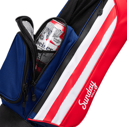 A close up shot of patriot Loma golf bag's insulated pocket with a canned drink inside
