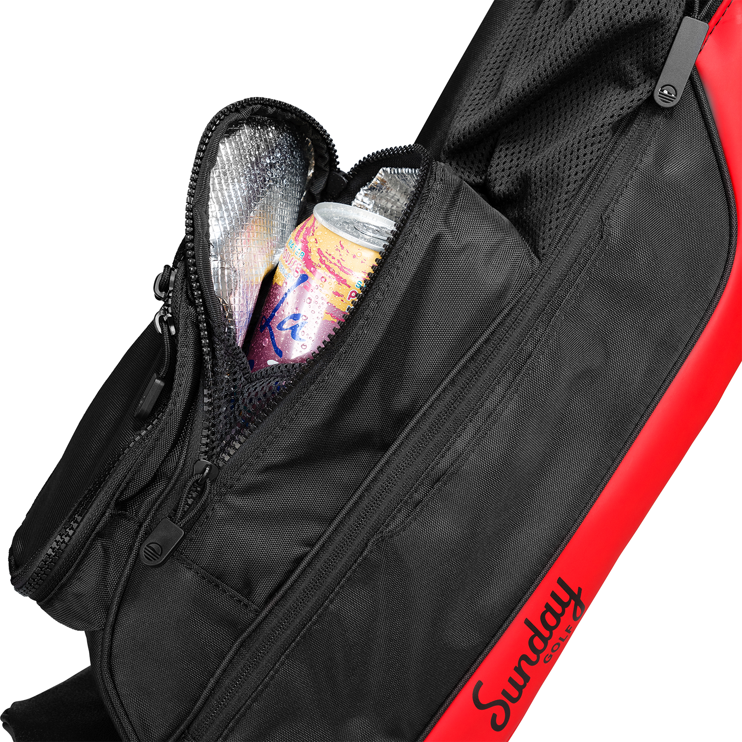 A close up shot of toasted almond Loma golf bag's insulated pocket with a canned drink inside
