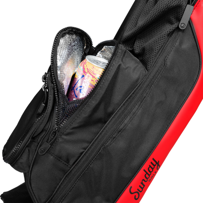 A close up shot of toasted almond Loma golf bag's insulated pocket with a canned drink inside
