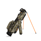 A full front shot of standing Loma golf bag in mossy oak bottomland with single strap