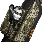 A close up shot of mossy oak bottomland Loma golf bag's insulated pocket with a canned drink inside