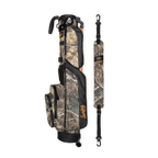A full shot of Loma golf bag in mossy oak country dna laying flat sideways beside its single strap