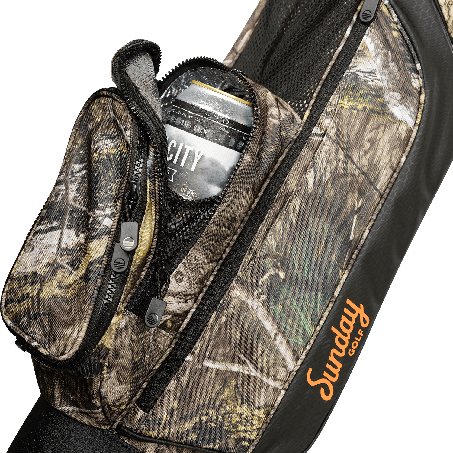 A close up shot of mossy oak country dna Loma golf bag's insulated pocket with a canned drink inside