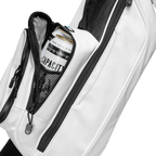 A close up shot of white vegan leather Loma S-Class golf bag's frosty pocket with a canned drink inside