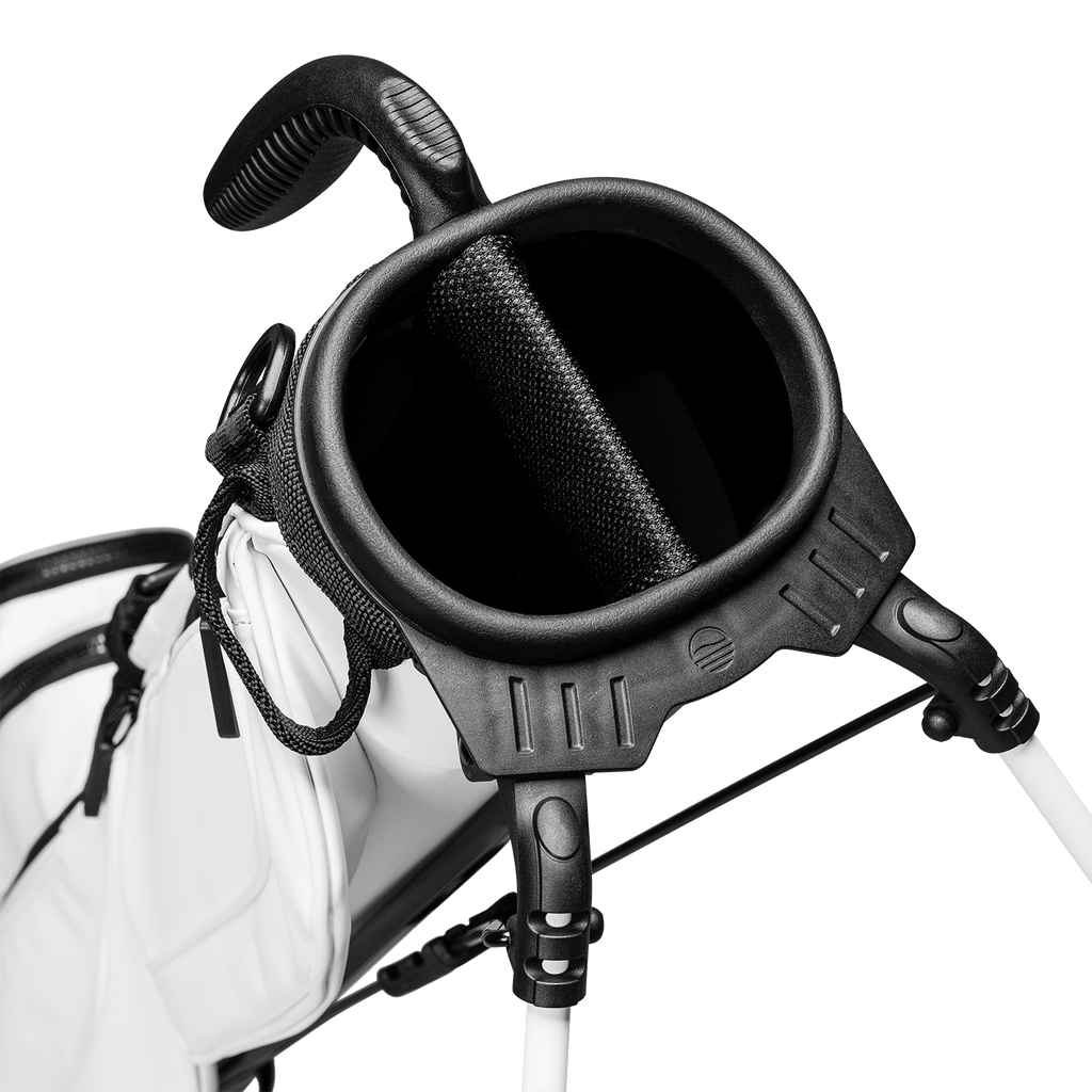 A close up top view of a white vegan leather Loma S-Class golf bag's full-length divider
