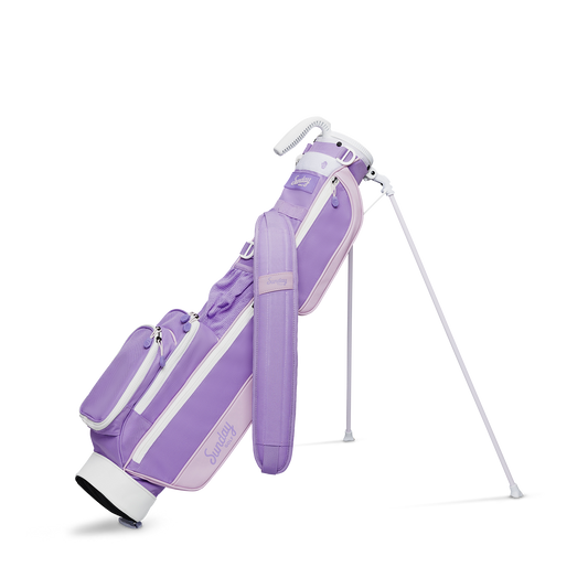A full front shot of standing Loma golf bag in lavender with single strap