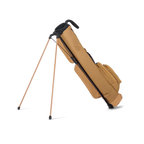 A full shot of standing Loma golf bag in clay thompson facing backward
