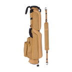 A full shot of Loma golf bag in clay thompson laying flat sideways beside its single strap
