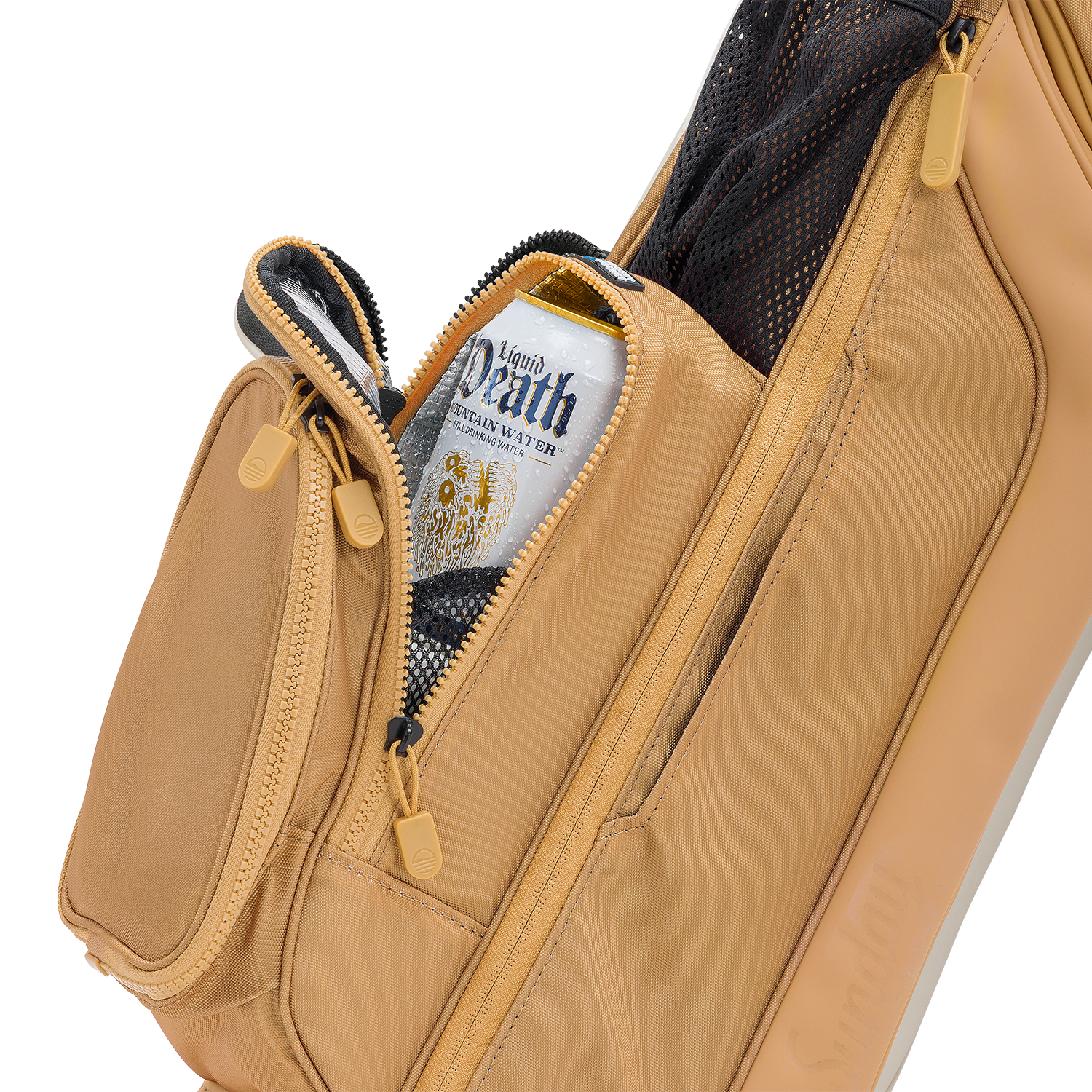 A close up shot of clay thompson Loma golf bag's insulated pocket with a canned drink inside
