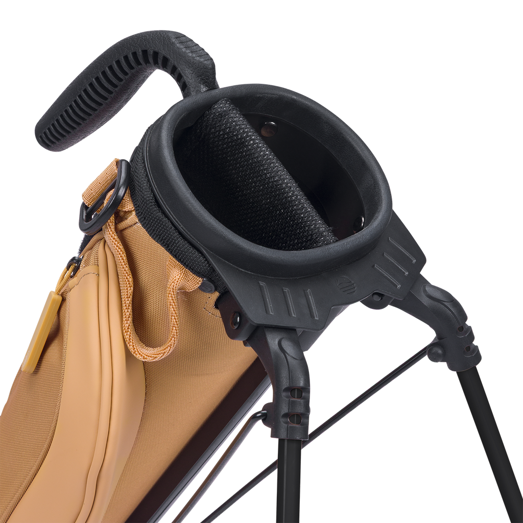Close-up of a golf bag with a black stand and handle on a white background
