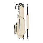 A full shot of Loma S-Class golf bag in Cream laying flat sideways beside its single strap
