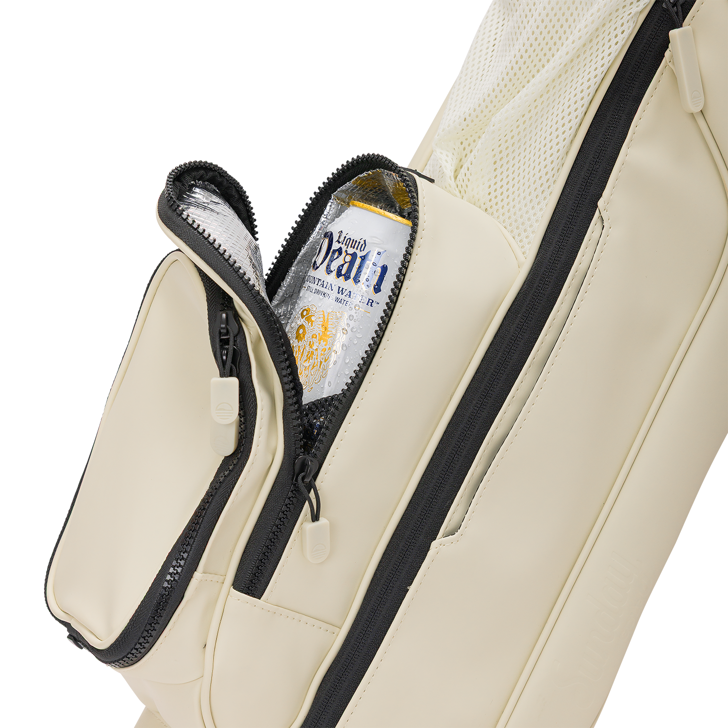A close up shot of Cream Loma S-Class golf bag's insulated pocket with a canned drink inside
