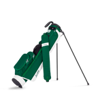 Green golf bag with a black and white club on a white background