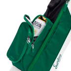 Green bag with a bottle of gin inside, on a white background