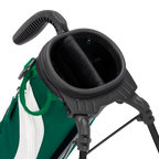 Close-up of a golf bag with a black club holder on a white background
