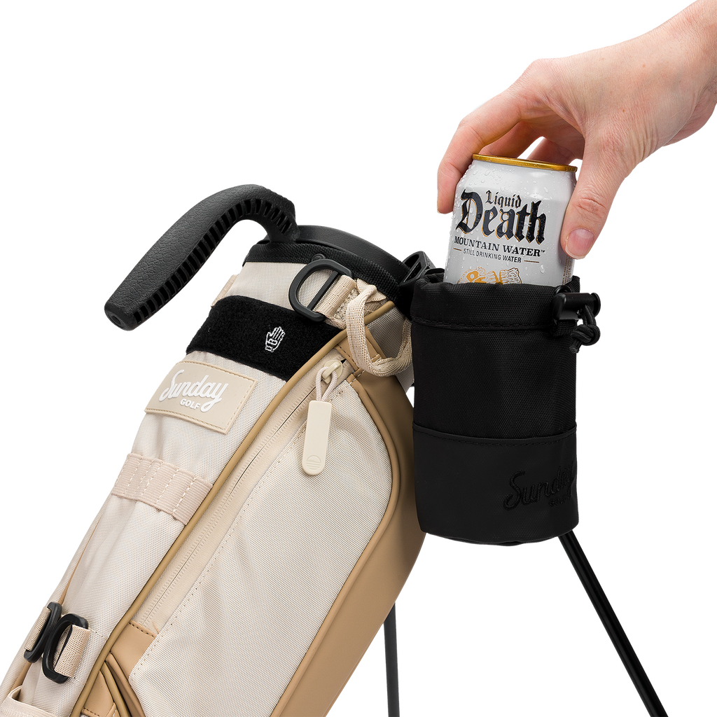 Loma bag with the Loma Koozie holding an alcoholic drink