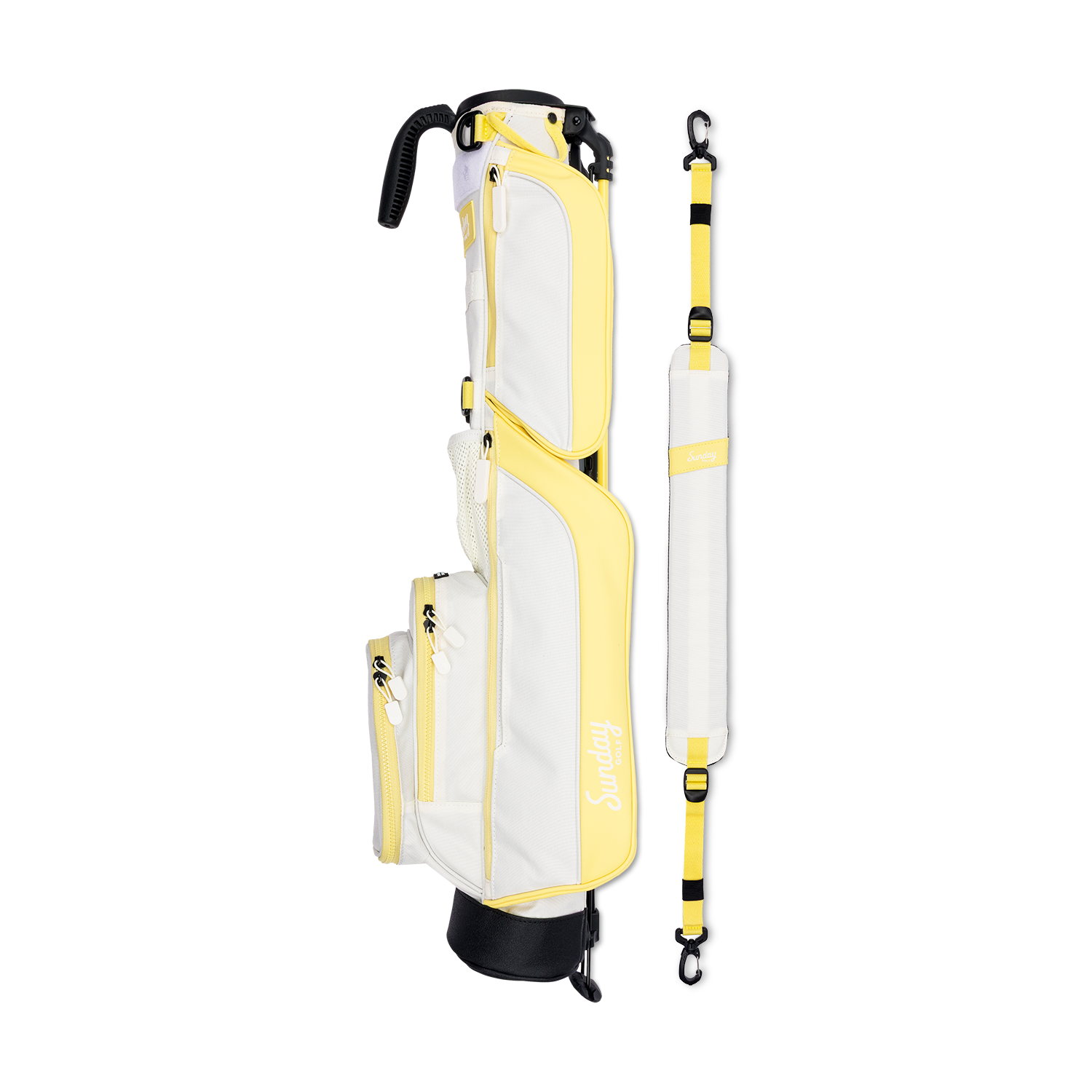 A full shot of Loma golf bag in Mindy Lemon laying flat sideways beside its single strap