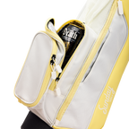 A close up shot of Mindy Lemon Loma golf bag's insulated pocket with a canned drink inside