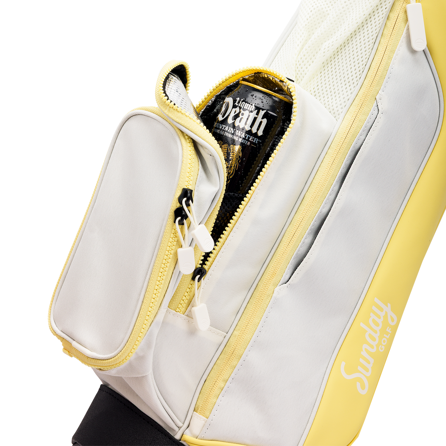 A close up shot of Mindy Lemon Loma golf bag's insulated pocket with a canned drink inside