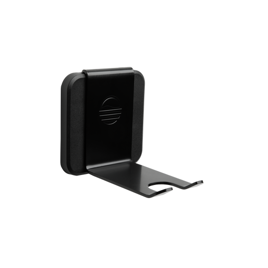 A black Loma Wall hook wall-mounted with a sleek design, made of durable steel with a plastic base plate.