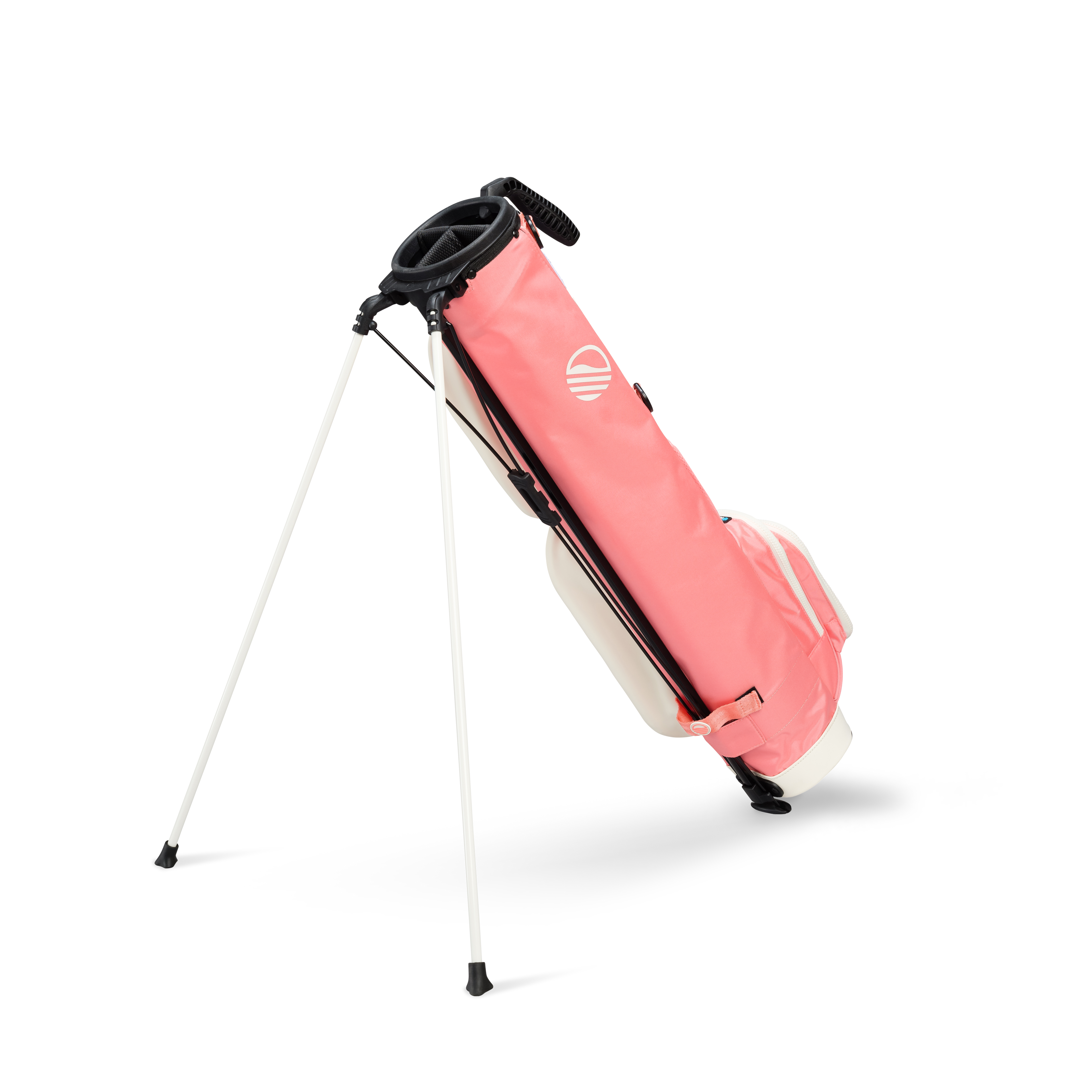 A full shot of standing Loma XL golf bag in coral facing backward