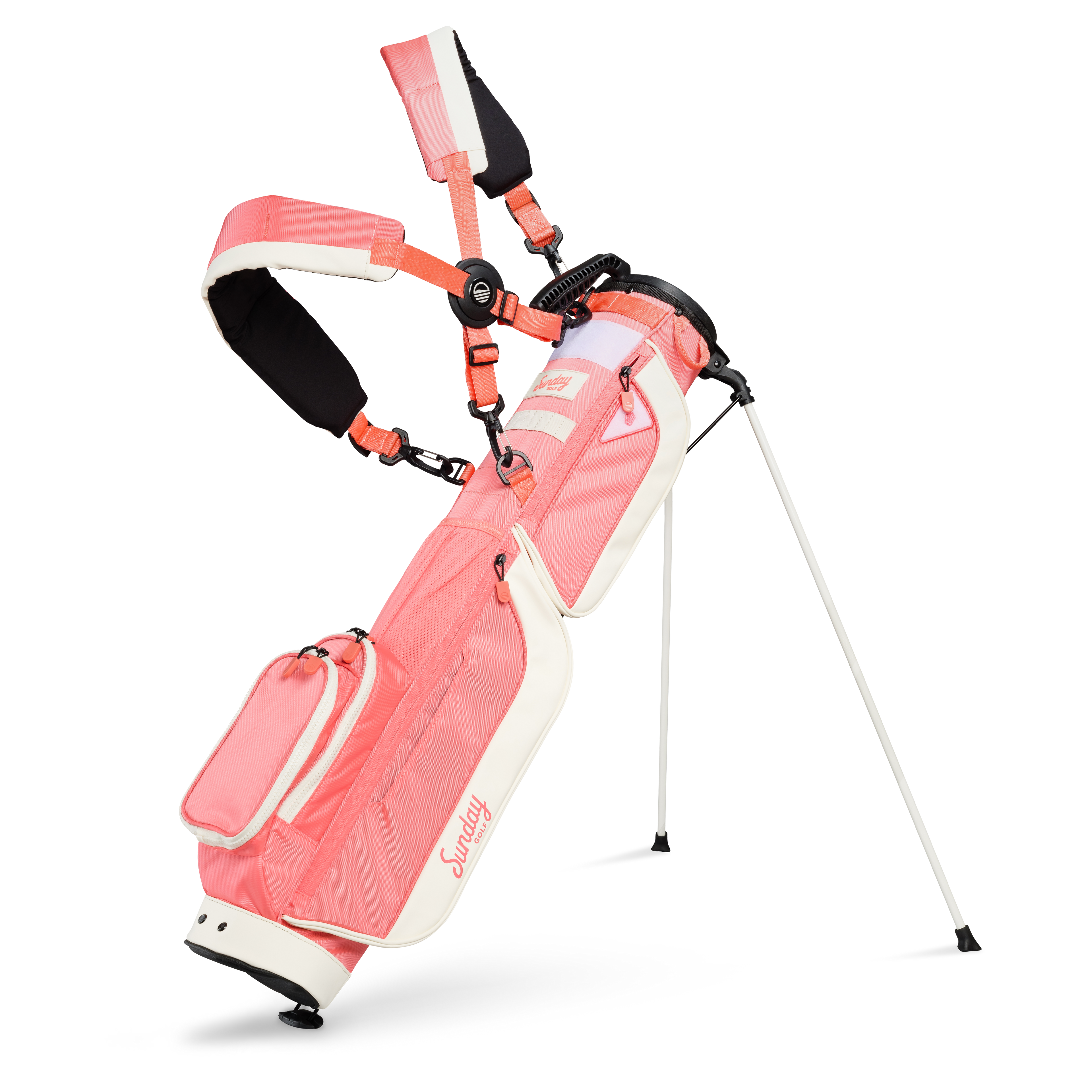 A full front shot of standing Loma XL golf bag in coral with double strap