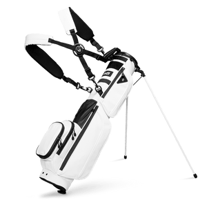 A full front shot of standing Loma XL S-Class golf bag in white vegan leather with double strap