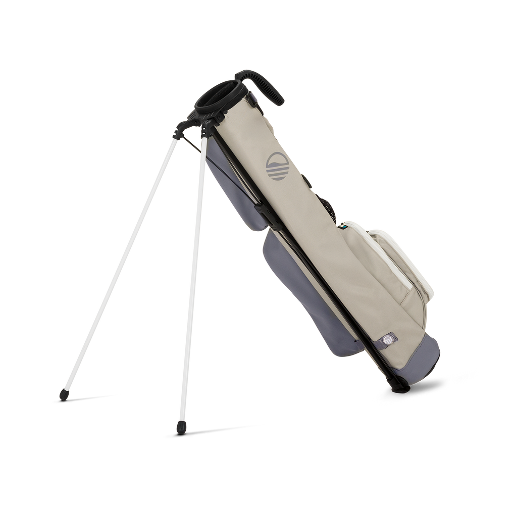 A full shot of standing Loma golf bag in Cool Gray facing backward
