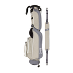 A full shot of Loma golf bag in Cool Gray laying flat sideways beside its single strap
