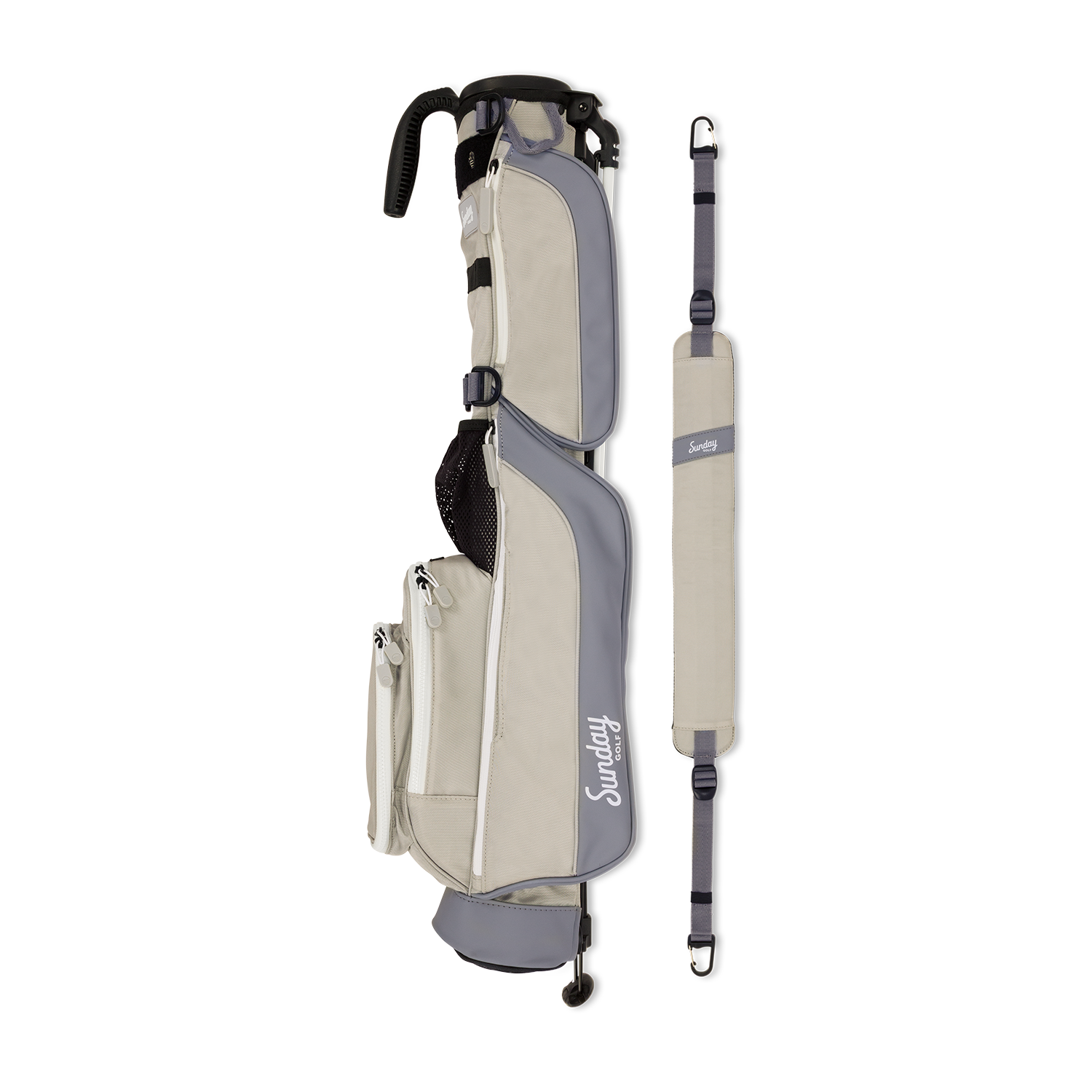 A full shot of Loma golf bag in Cool Gray laying flat sideways beside its single strap
