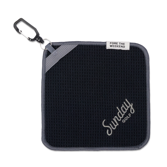 Black and gray magnetic towel with carabiner and 'Fore the Weekend' tag, featuring 'Sunday Golf' branding.