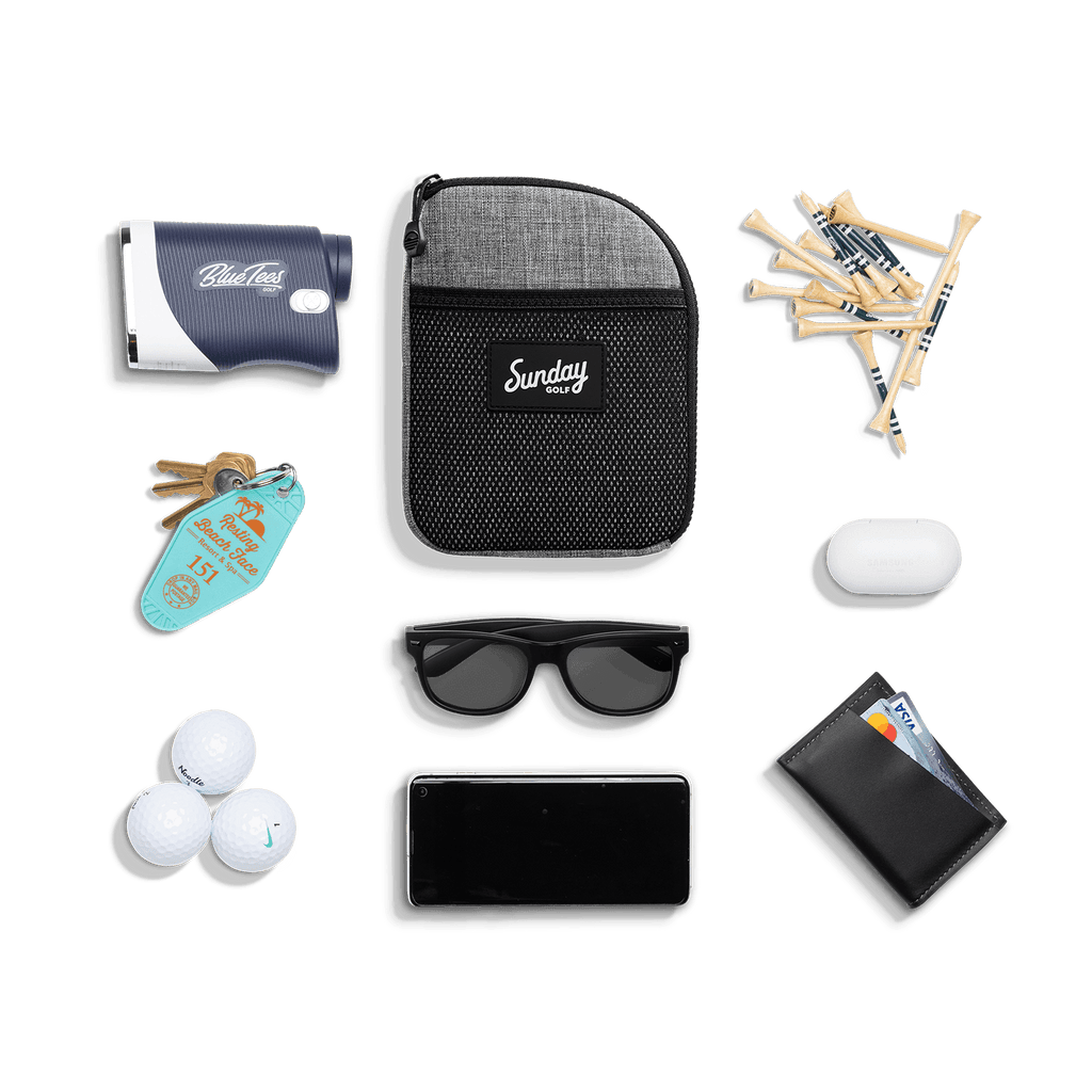 Heather gray nickel bag valuables pouch laying flat with items it can hold 