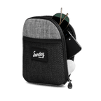 Heather gray nickel bag valuables pouch unzipped with items showing from inside