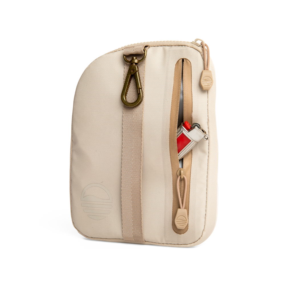 Rear view of toasted almond nickel bag valuables pouch unzipped with a lighter showing from inside