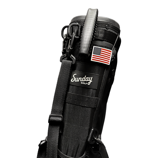 Black Loma golf bag with American flag patch on it