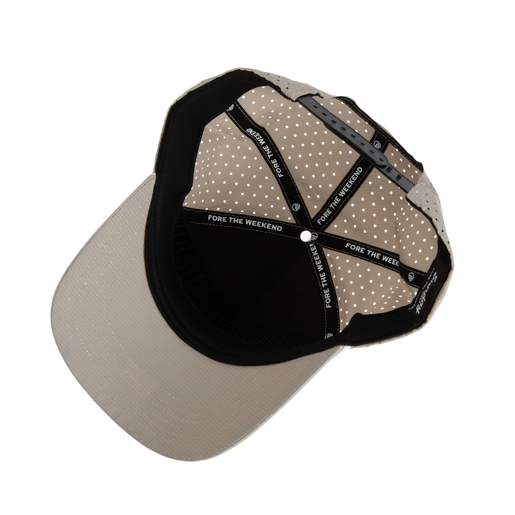 Upside down shot of tan Porter snapback golf hat