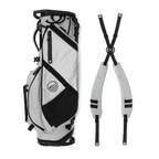 A full shot of Ranger golf bag in Off Gray laying flat sideways beside its double strap
