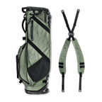 A full shot of Ranger golf bag in Sage laying flat sideways beside its double strap
