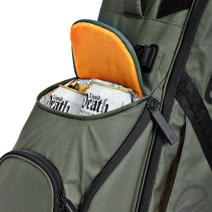 A close up shot of Sage Ranger golf bag's frosty pocket with canned drinks inside
