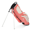 A full shot of standing Ryder golf bag in coral facing backward